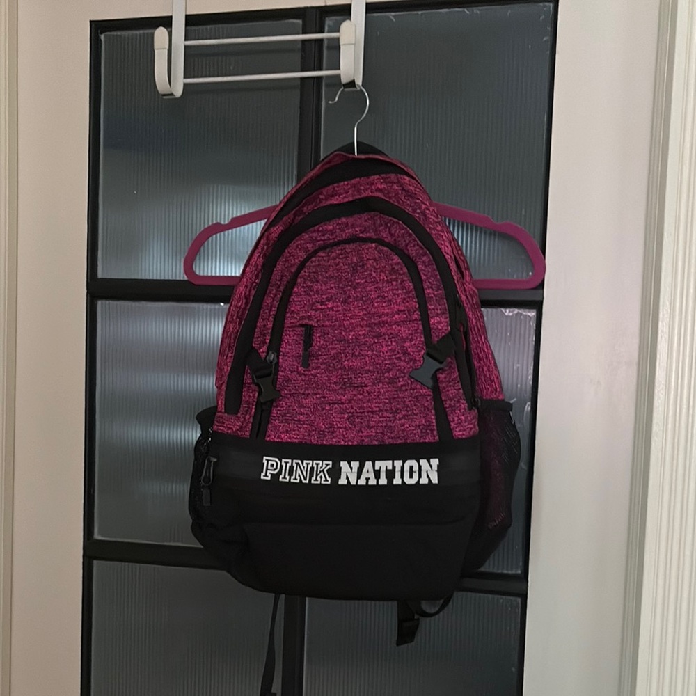 Pink Nation Backpack - Pink and Black great condition with 4 different pockets